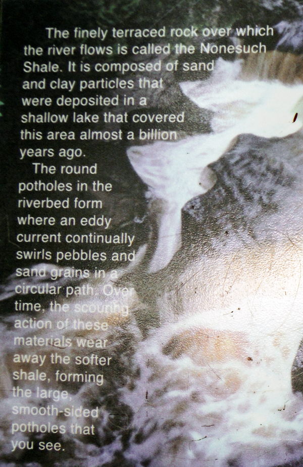 sign about the Riverbed and the potholes